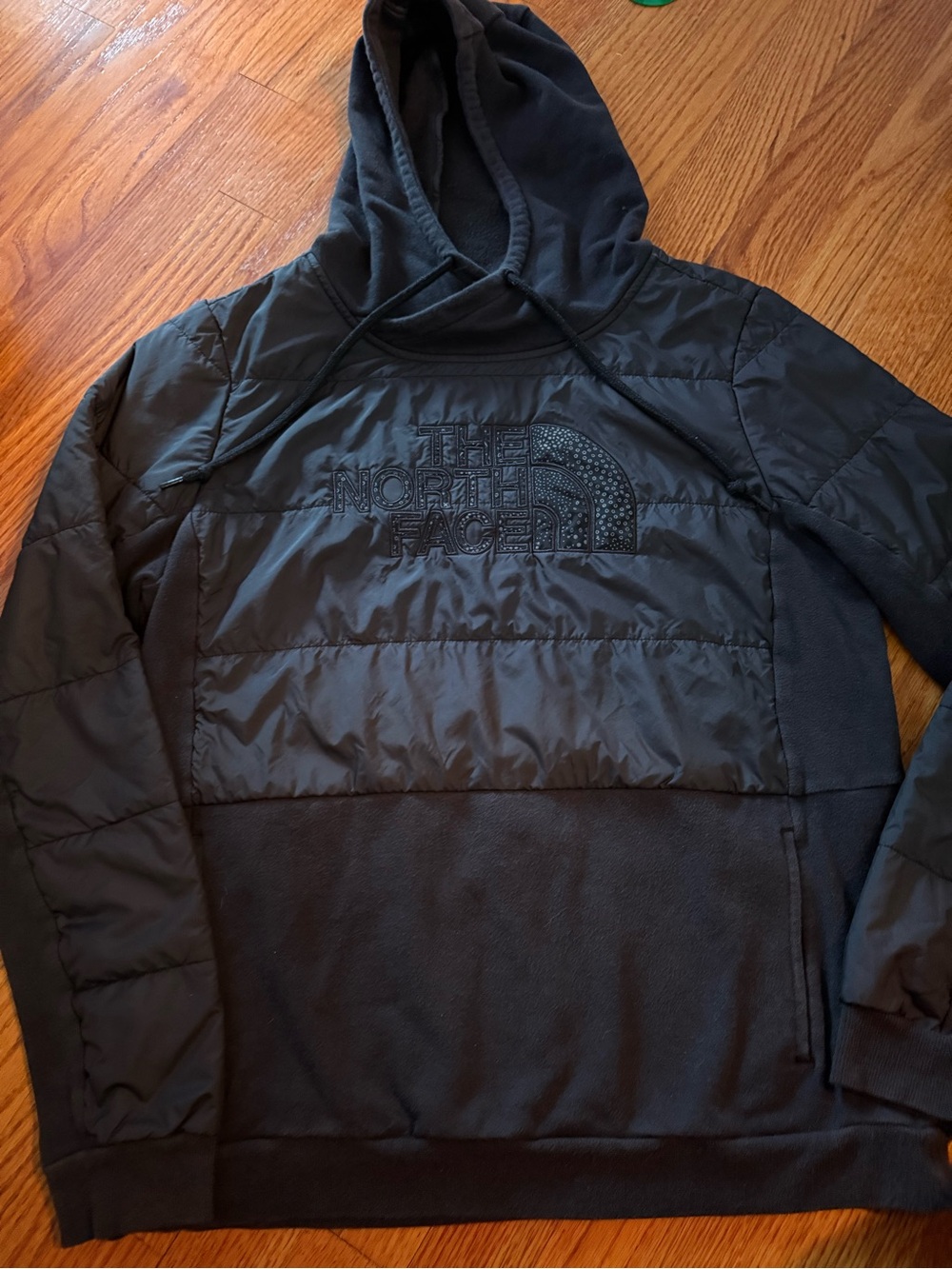The North Face Women's black reflective puffer pull-over hoodie